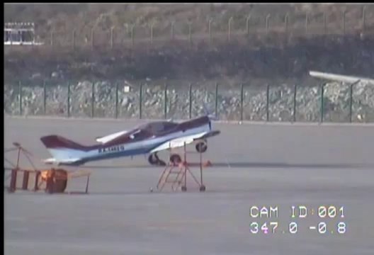 A stopped plane flying off because of the wind