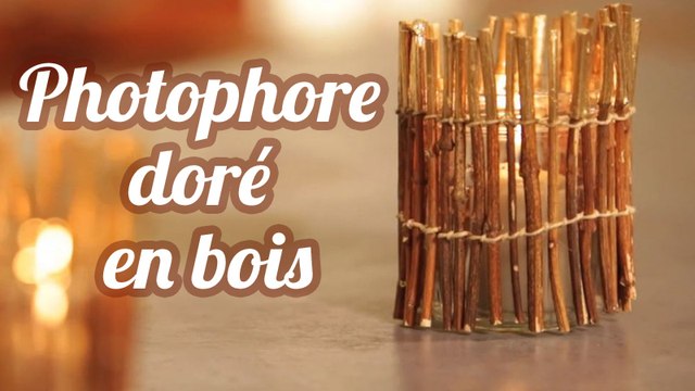 Photophore avec des branchages dorés