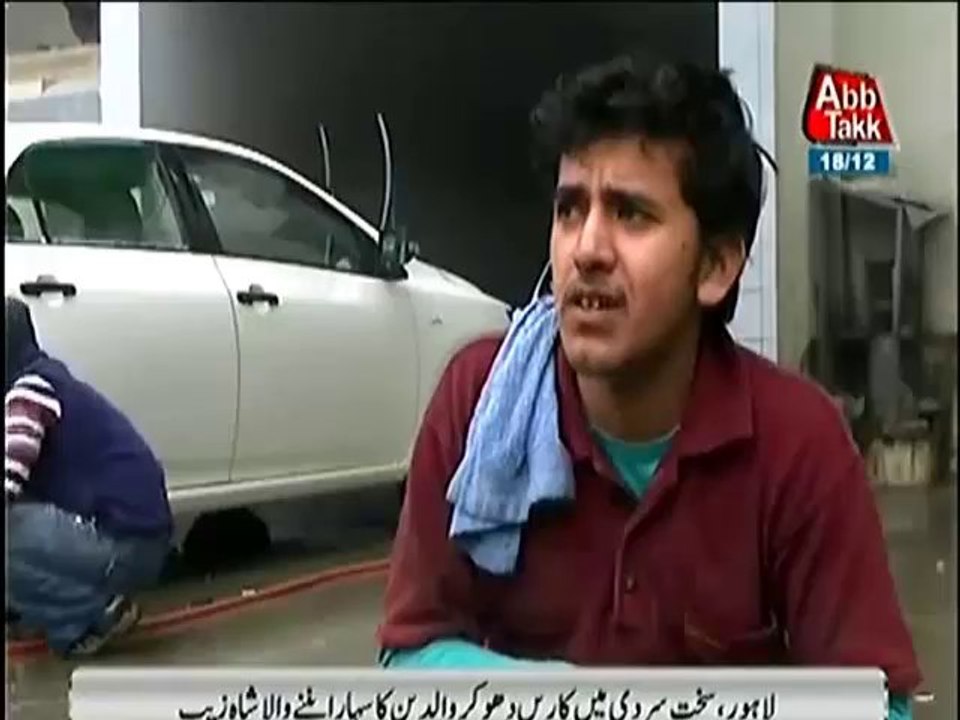 THIS BOY WASHES CAR IN COLD TO EARN MONEY FOR HIS STUDIES