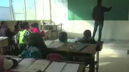 Pushing for education in war-torn Syria