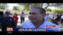 Padres se enfrentan a maestros que intentaron tomar escuela en México (1/2)