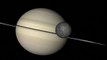 CU grey moon orbits Saturn mid rings