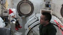 Robot astronaut and human astronaut meet in space