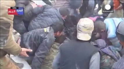 Amateur video shows Syrian airstrikes, children pulled from rubble