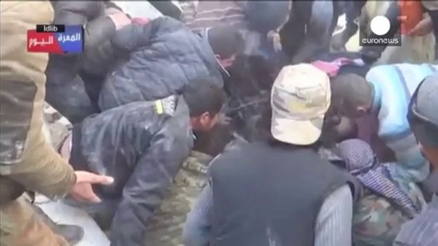 Amateur video shows Syrian airstrikes, children pulled from rubble