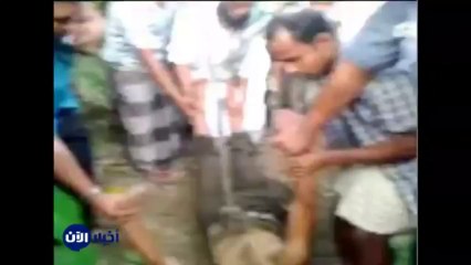 بوذيون يعلقون مسلما أعلى شجرة ويشنقونه - قناة أخبار الآن