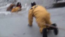 Firefighters saves a Dog stuck in Icy River
