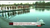Europeus se aventuram em lagos gelados para a natação de Natal
