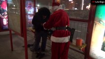 Santa gives gifts to the homeless