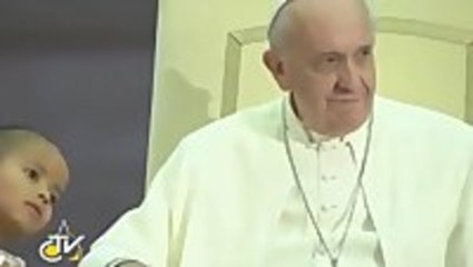 Pope gets photobombed by Boy who then refuses to leave Vatican stage