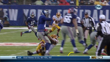 Eli Manning injures ankle stays in and throws an interception