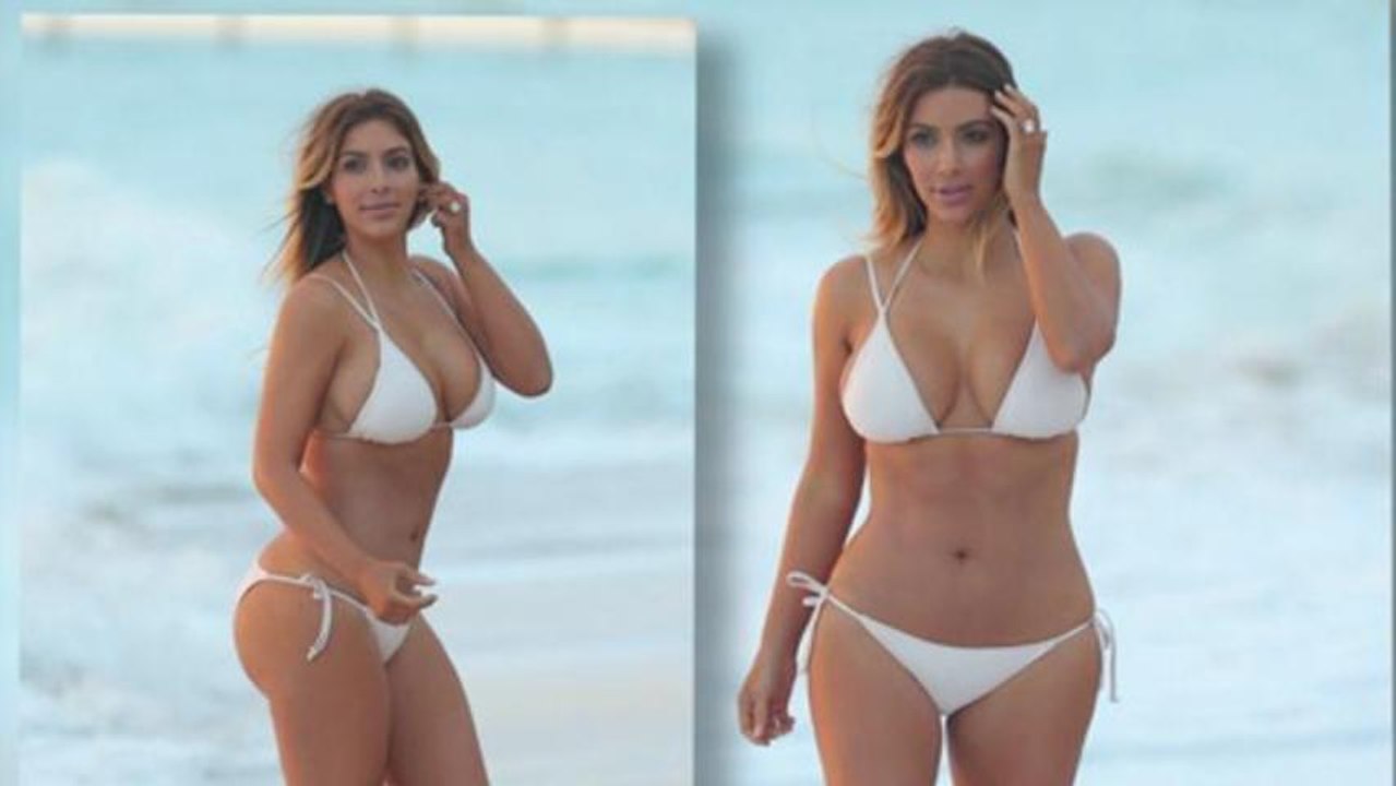 Kim Kardashian Hits The Beach in Bikini