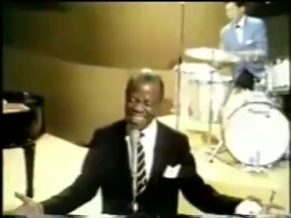 LOUIS ARMSTRONG  - What a wonderful world.