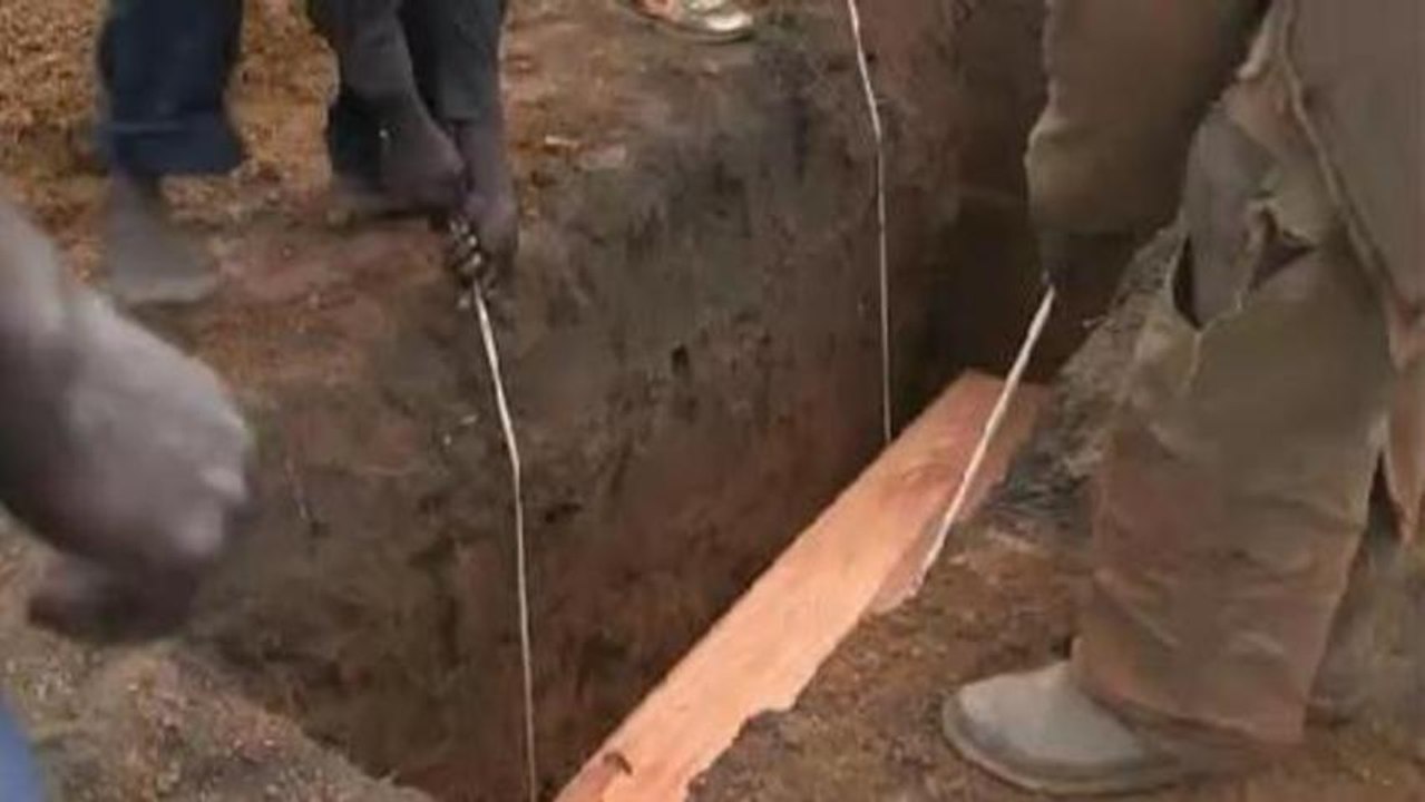 Uganda reburies people killed a decade ago