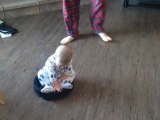 Adorable Baby Rides Roomba!