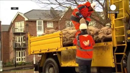 Western France and Britain raked by storms and flooding