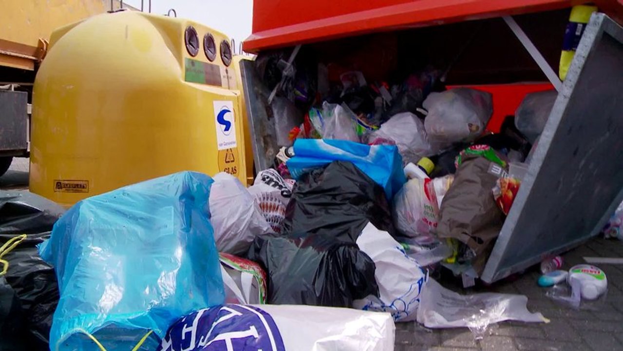 Man in recycle container