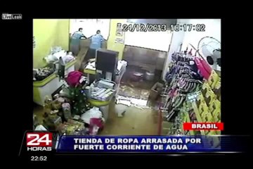 Impactantes imágenes de inundación que arrasa tienda de ropa en Brasil
