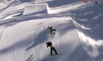 Insane Snowboard Fall. Never Stand in the Landing of a Ski Jump