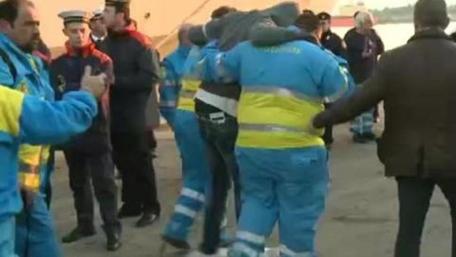 Migrants rescued by Italian Navy reach Sicily