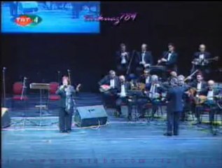Belkıs AKKALE-Siyah Perçemini Dökmüş Yüzüne