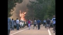 Smoke blankets Santiago as firefighters battle forest fires