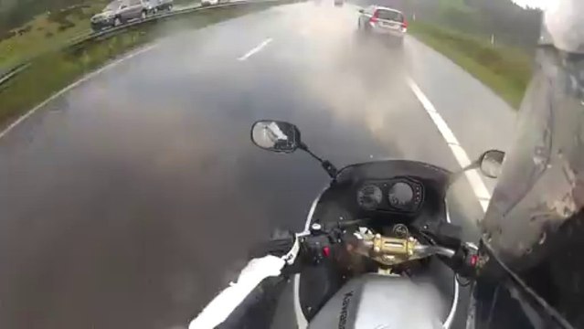 Kawasaki ER6 motorcycle driver in a flood (A28 Highay flooded)