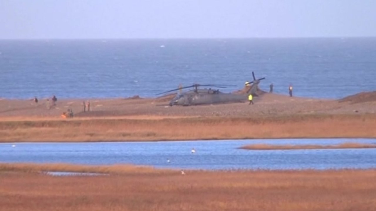 UK police investigate deadly helicopter crash site