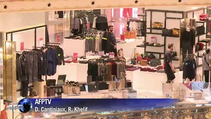 Paris shoppers storm store as sales open