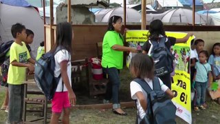 In the Philippines, children ring in the new school year