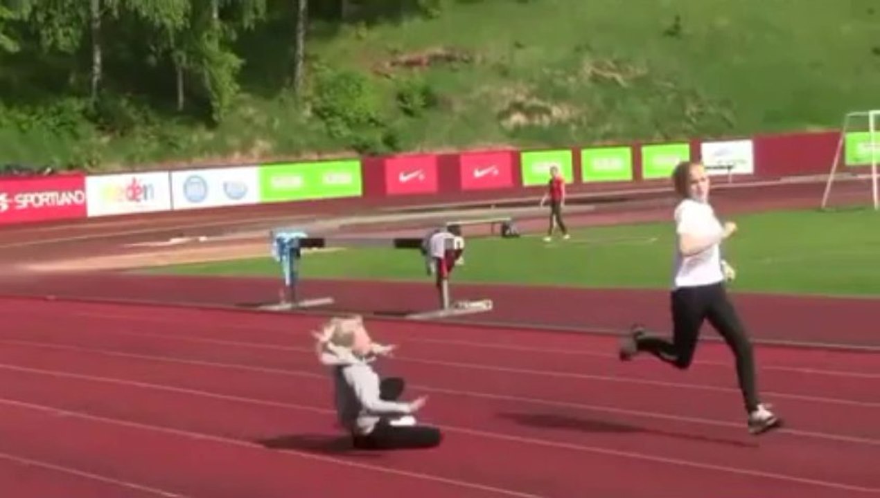 Young lady has altercation with invisible obstacle