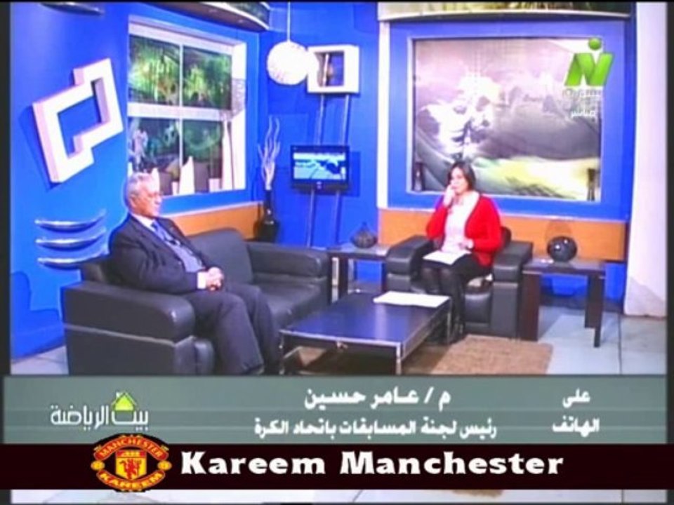 مداحله عامر حسين رئيس لجنه المسابقات باتحاد الكره مع الاعلاميه سماح عمار فى بيت الرياضه الاربعاء 15 يناير 2014