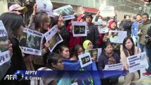 Hong Kong domestic helpers demand justice for 'tortured maid'