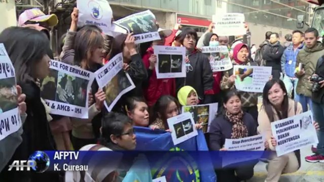 Hong Kong domestic helpers demand justice for 'tortured maid'