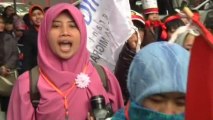 Hundreds demand justice for abused Indonesian maid