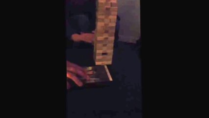 Guy Successfully Removes Last Bottom Jenga Piece Without Collapsing Tower