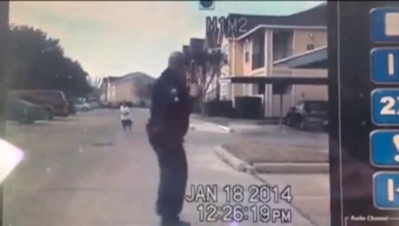 A Cop playing football with a kid! So cute moment!