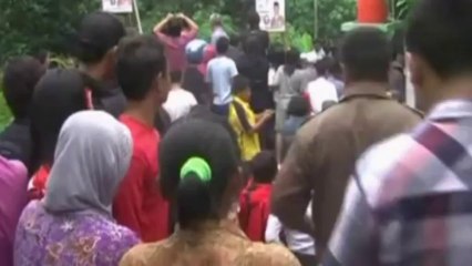 Bridge collapses into Indonesian river, killing two