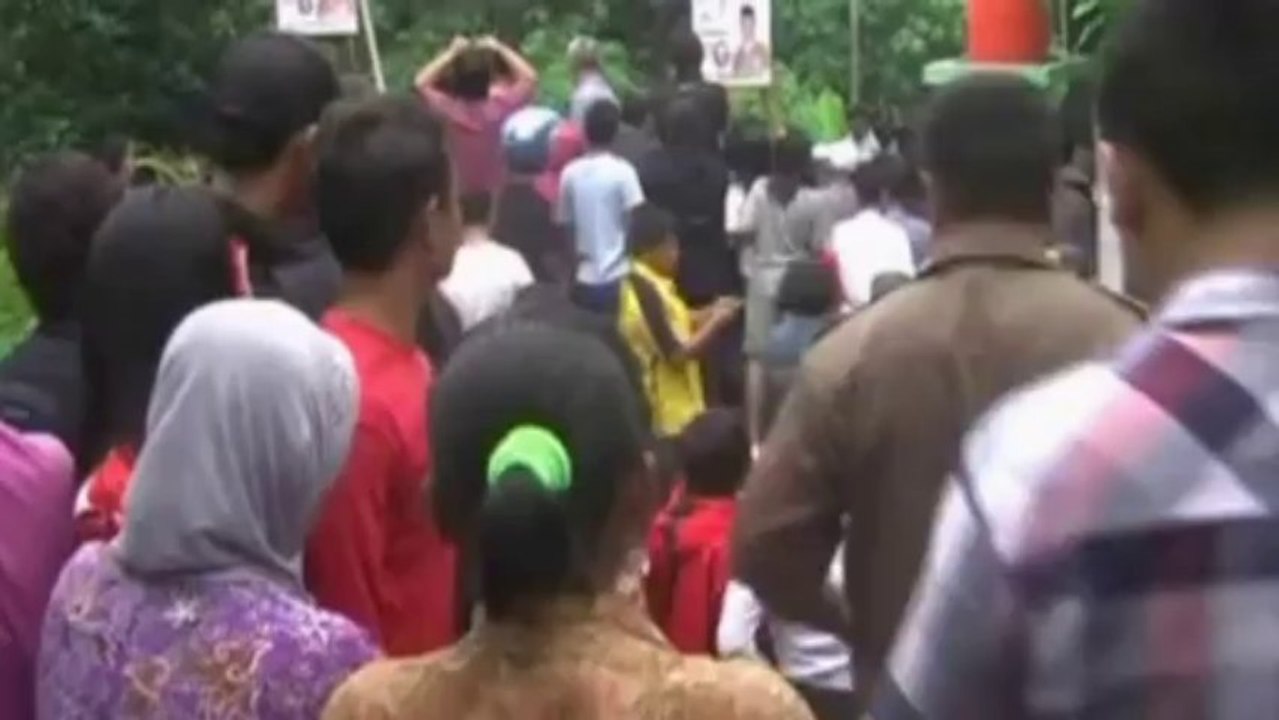 Bridge collapses into Indonesian river, killing two