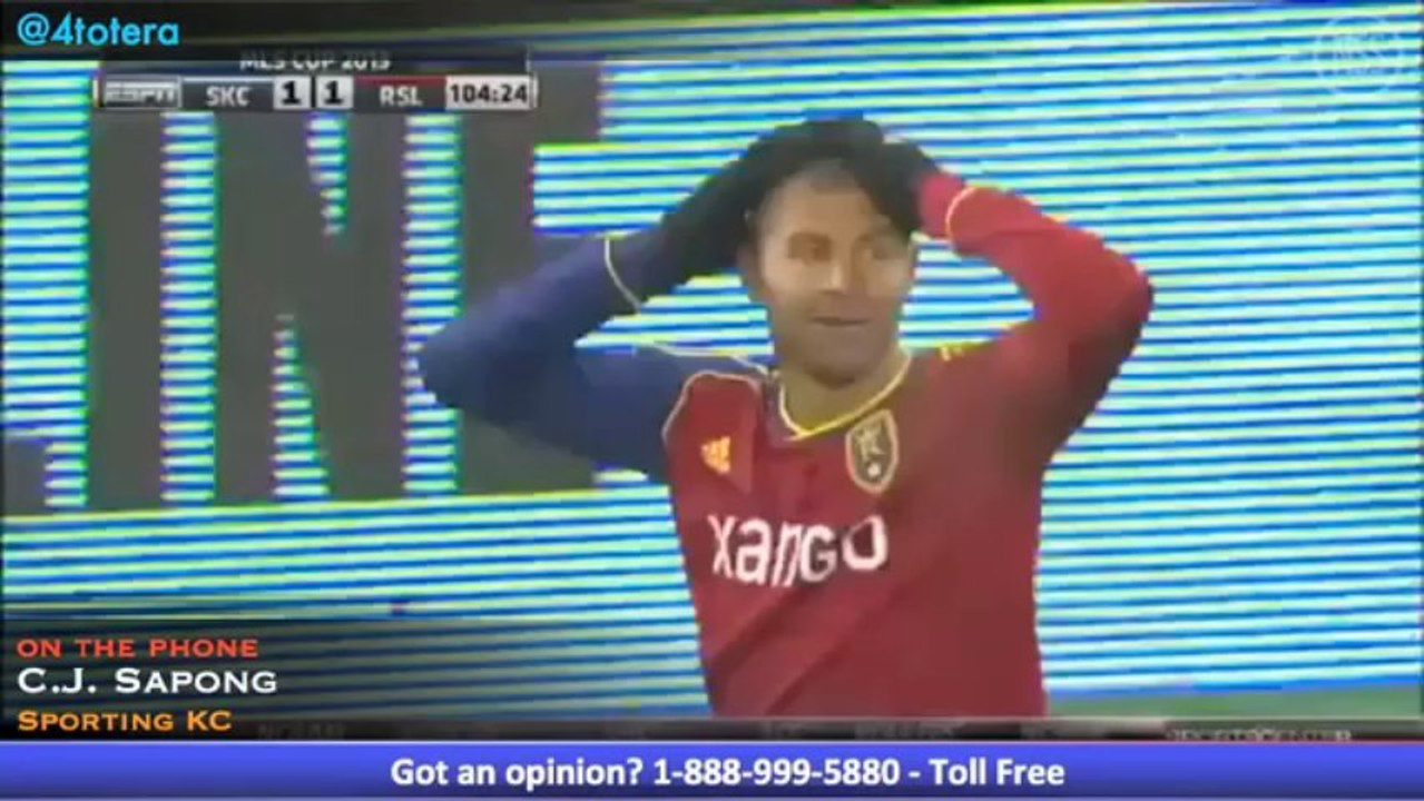 Sporting KC Forward C.J. Sapong and James Madison Head Coach Tom Martin