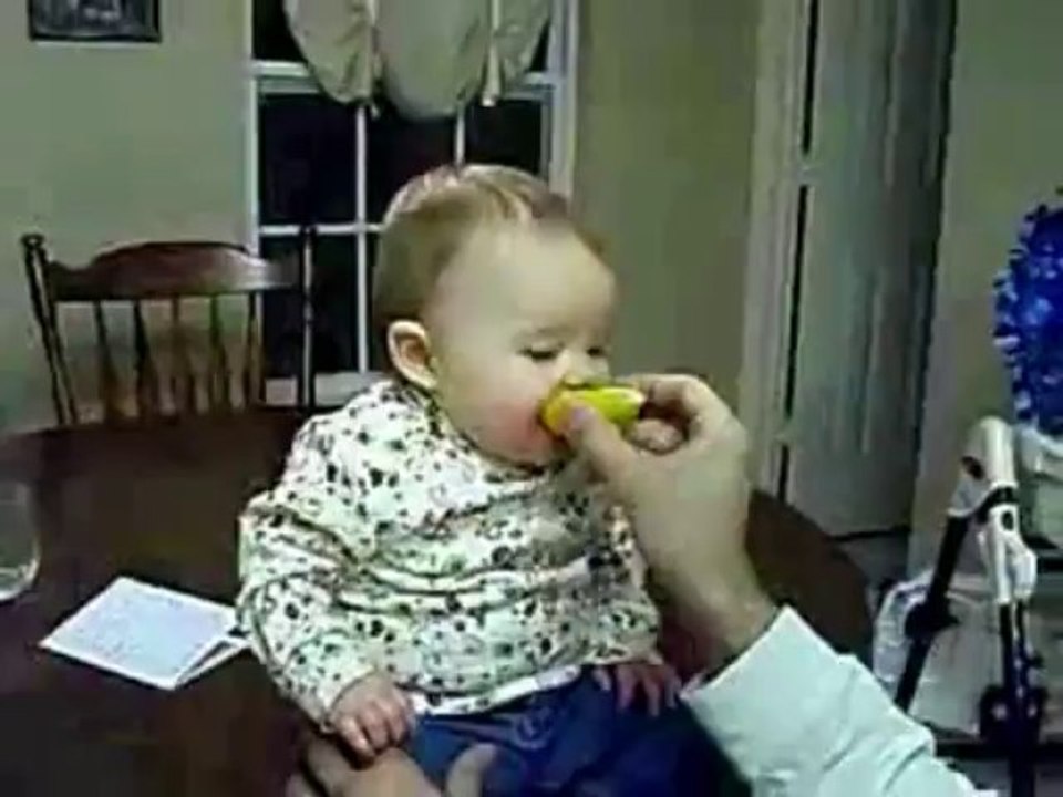 Baby Eats a Sour Lemon