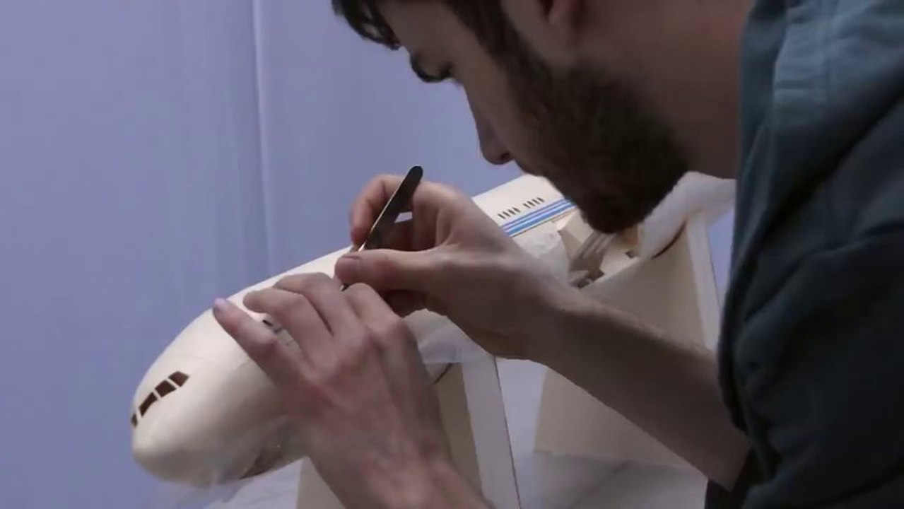 Time-lapse of the creation of a paper plane :  Air India Model 777-300ER