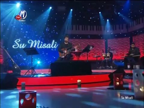 WwW.SesliGamze.Com Orhan Ölmez - Şimdi Uzaklardasın Hayallerdesin { Su Misali }