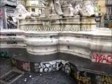 Fontana monteoliveto con cartelli e degrado