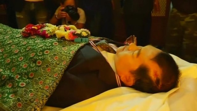 Mourners honor Thai protester leader killed in violence