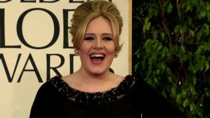 Adele Celebrates Grammy Win From Bed