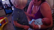 Little Kid Has The Cutest Reaction Seeing His Baby Brother For The First Time