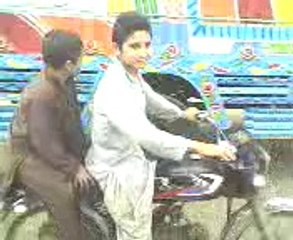 pathan on bike - one wheel