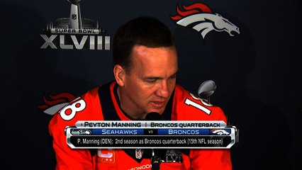 Manning: Carroll is a 'great coach'