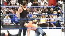 Undertaker destroys Cena and RVD